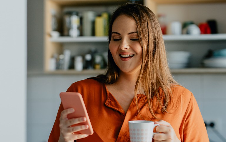 Woman looking at Novo Nordisk News on her phone