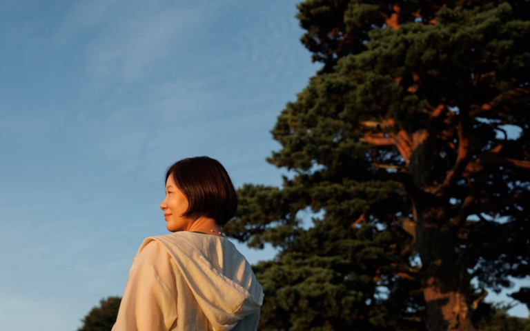 Woman watching a sunrise