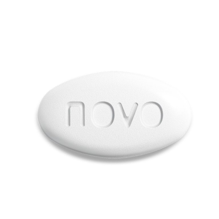 Wegovy® 25 mg pill, pictured from the top, showing the "novo" side