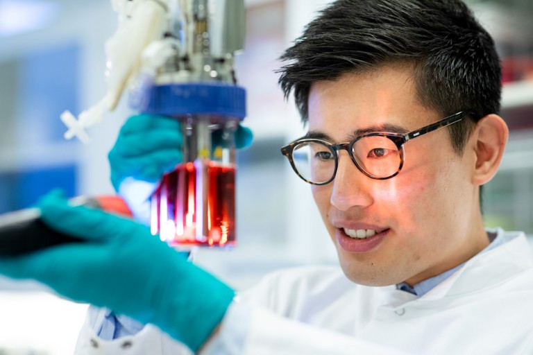 A Novo lab technician working with equipment