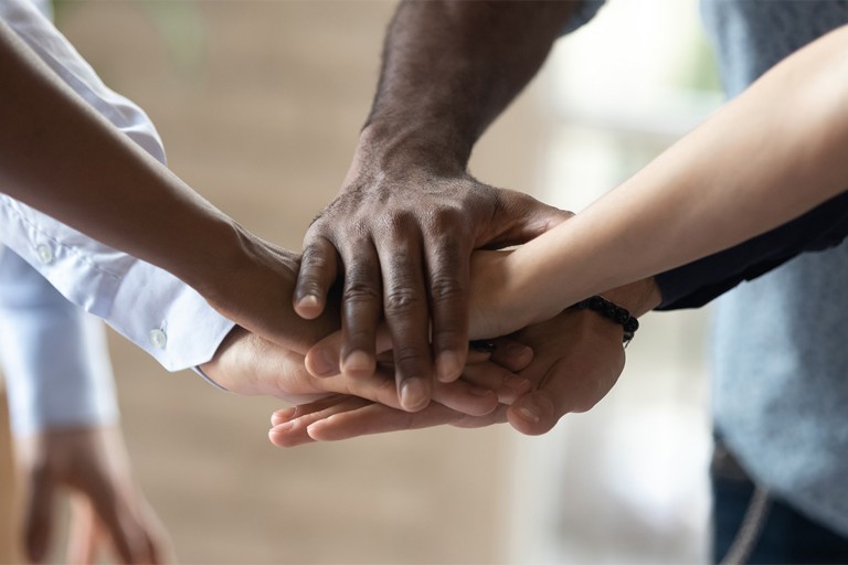 A team celebrating collaboration