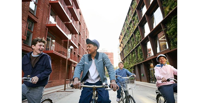 children in the street on their bikes