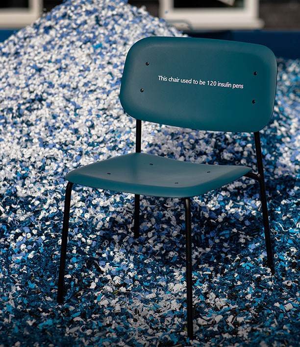 Plastic chairs and recycled lamps