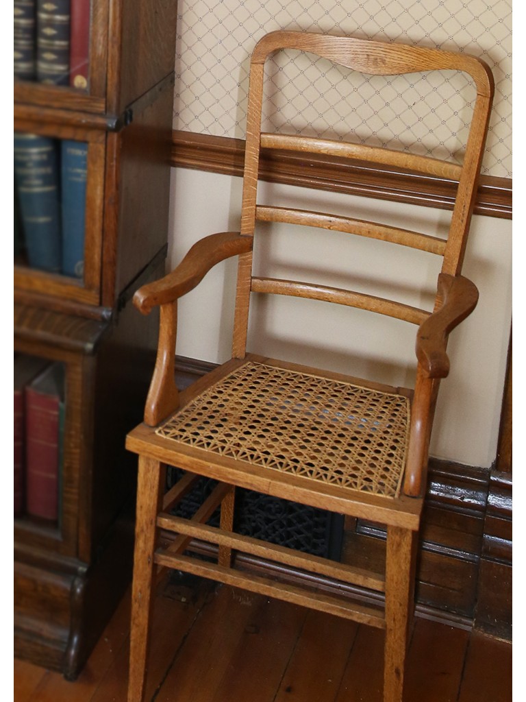 Wooden chair with wicker seat