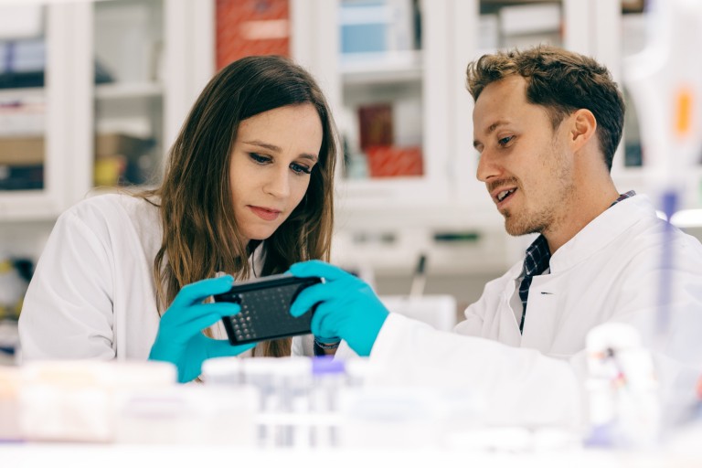 Two Novo Nordisk colleagues working in the lab